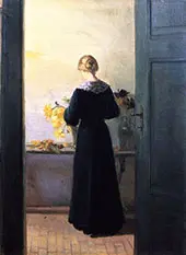 Young Woman Arranging Flowers By Anna Ancher