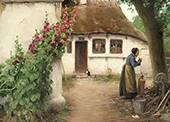A Woman at a Farmhouse with Red Hollyhocks By Hans Andersen Brendekilde