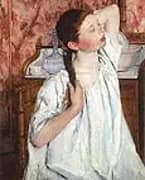 Girl Arranging Her Hair By Mary Cassatt